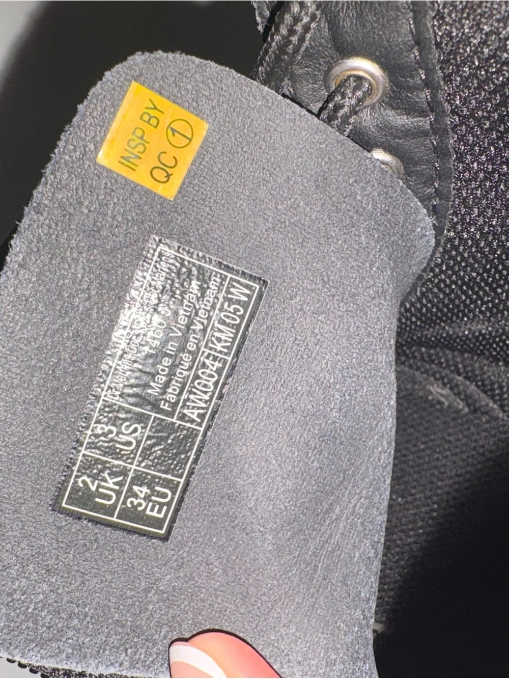Dr. Martens Black Patent 8-Eye Boots with Yellow Stitching
